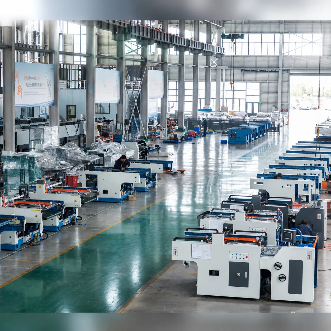 SAGLIN Machinery assembly hall — modular cells for cardboard lamination, window patching, and cold foil stamping equipment